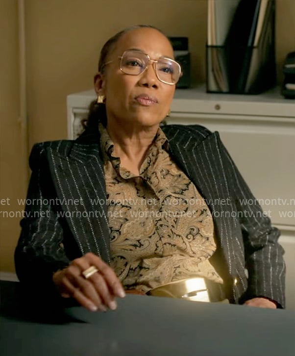 Amanda’s paisley print blouse and black pinstripe blazer on Will Trent