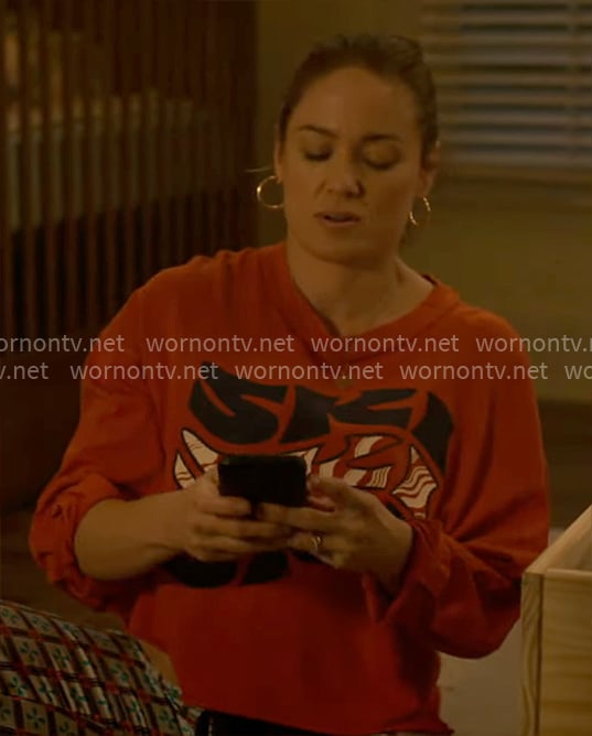 Angie’s red SKI SKI SKI tee on Will Trent