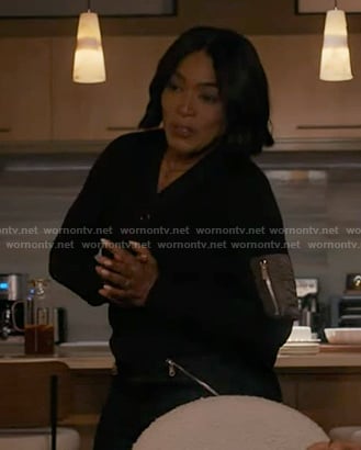 Athena’s black cardigan with patch pocket on 9-1-1