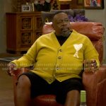 Calvin’s mustard yellow cardigan with heart on The Neighborhood