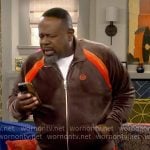 Calvin’s brown and orange velour track suit on The Neighborhood