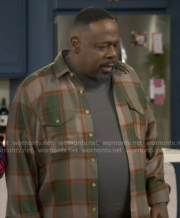 Calvin’s olive plaid shirt on The Neighborhood