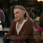 Claire’s brown sweater with white trim on The Young and the Restless