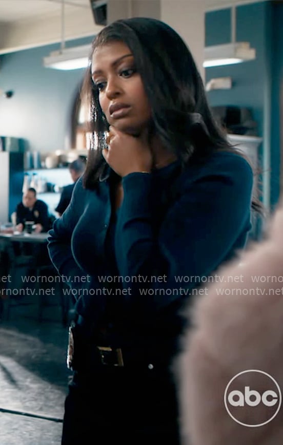 Daphne’s navy blue cardigan on High Potential