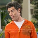 Dave’s orange zip jacket on The Neighborhood