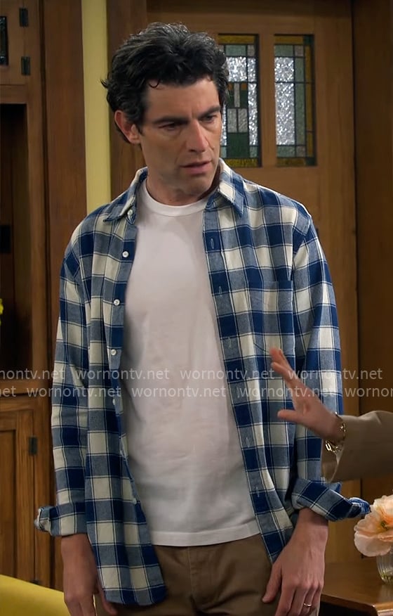 Dave’s blue checked shirt on The Neighborhood