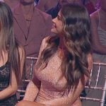 Demi’s orange ruffle hem metallic dress on The Secret Lives of Mormon Wives