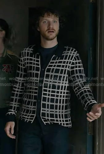 Flynn’s navy’s plaid cardigan on 9-1-1