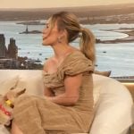 Hilary Duff’s beige off shoulder velvet dress on The Drew Barrymore Show