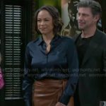 Nicole’s navy shirt and brown leather skirt on Beyond the Gates