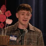 Jacob’s check print jacket on Abbott Elementary