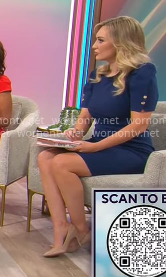 Kelly O’Grady’s dark blue puff-sleeve dress on CBS Mornings
