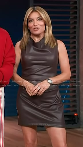 Kit’s brown sleeveless leather mini dress on Access Hollywood