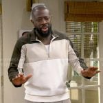 Malcolm’s colorblock quarter zip sweatshirt on The Neighborhood