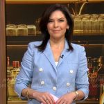 Meg Oliver’s light blue blazer with white buttons on CBS Mornings