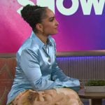 Robin Arzon’s blue satin blouse and floral pants on The Kelly Clarkson Show