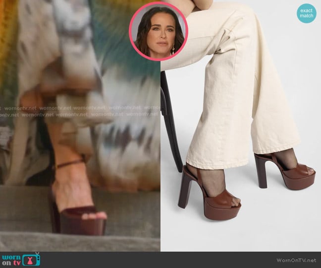 Saint Laurent Jodie Leather Ankle-Strap Platform Sandals in Brown worn by Kyle Richards on The Real Housewives of Beverly Hills