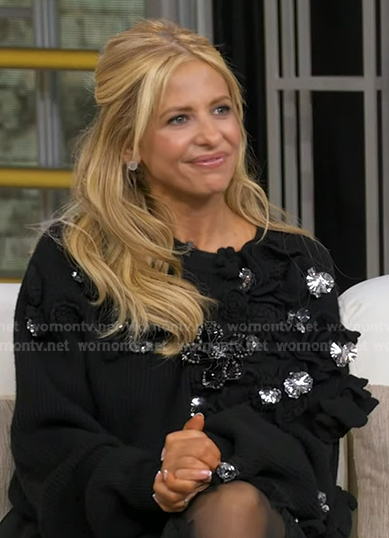 Sarah Michelle Gellar’s black floral embellished sweater on Good Morning America