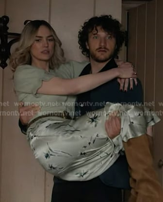 Tia’s green short sleeve cardigan and floral skirt on 9-1-1