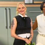 Tini Younger’s black pleated top and skirt on Tamron Hall Show
