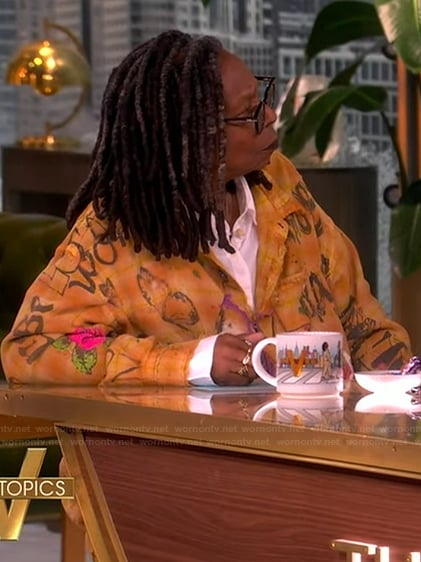 Whoopi’s orange printed top on The View