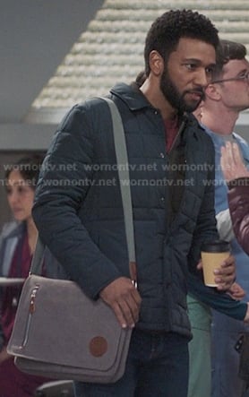Winston’s navy quilted padded jacket and grey satchel bag on Greys Anatomy