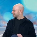 Adam Grant’s navy jacket and leather sneakers on Today
