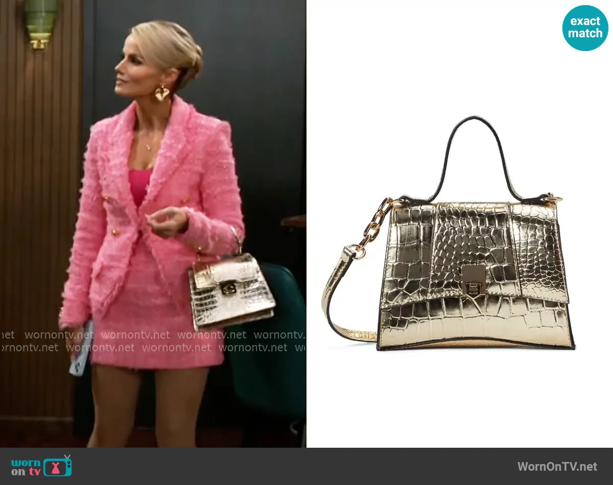 Aldo Attunga Bag worn by Vanessa McBride (Lauren Buglioli) on Beyond the Gates