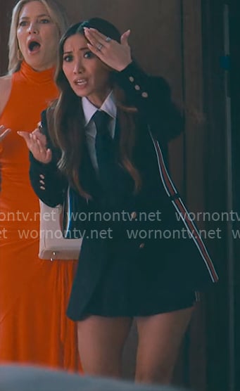 Ali’s black side-stripe blazer on Running Point