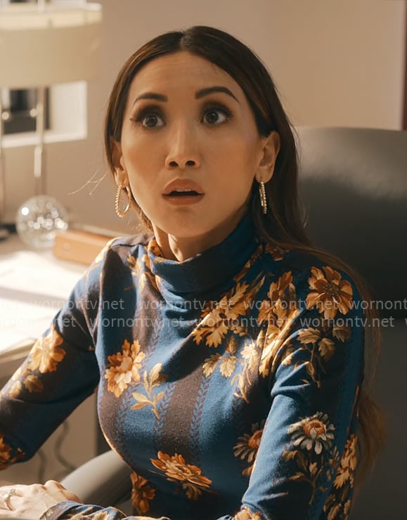 Ali’s blue floral top on Running Point