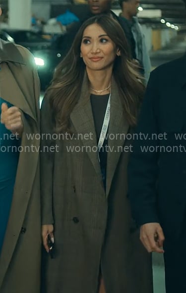 Ali’s plaid coat on Running Point