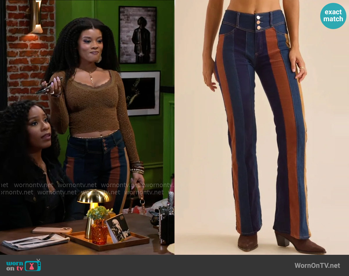 Altar'd State Nova High Rise Suede Stripe Flare Pant worn by Eva Thomas (Ambyr Michelle) on Beyond the Gates