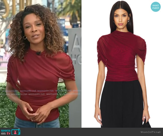 Amanda Uprichard Evianna Top in Wine worn by Zuri Hall on Access Hollywood