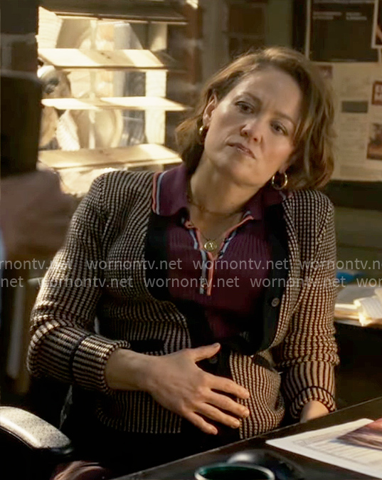Angie’s purple polo top and textured cardigan on Will Trent