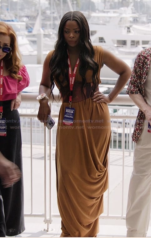 Ava’s mustard drape dress on Abbott Elementary