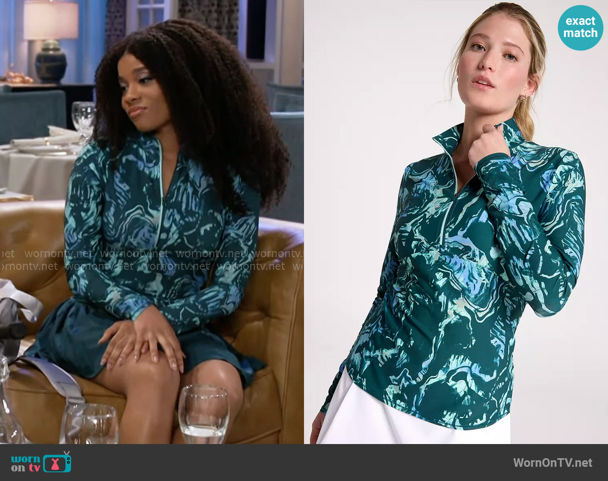 Calia Golf UV 1/4 Zip in Dark Sea Moss worn by Eva Thomas (Ambyr Michelle) on Beyond the Gates