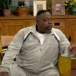 Calvin’s velour track suit with stripe details on The Neighborhood