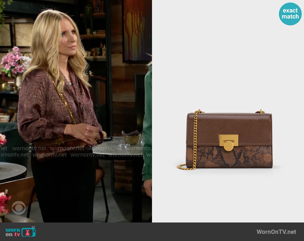 Charles & Keith Ebba Snake Bag worn by Christine Blair Williams (Lauralee Bell) on The Young and the Restless