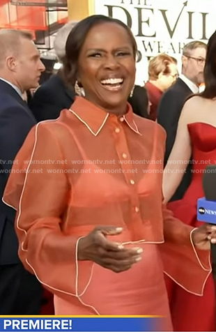 Deborah’s coral sheer shirt and pencil skirt on Good Morning America