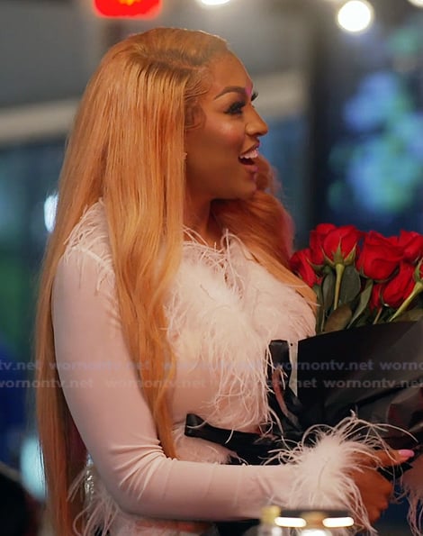 Drew’s white feather trim top on The Real Housewives of Atlanta