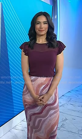 Emilie’s purple ruffle sleeve top and swirl print skirt on Today