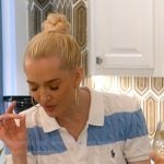 Erika’s white and blue stripe polo sweater on The Real Housewives of Beverly Hills