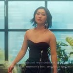Gigi’s black zip detail strapless top on XO Kitty