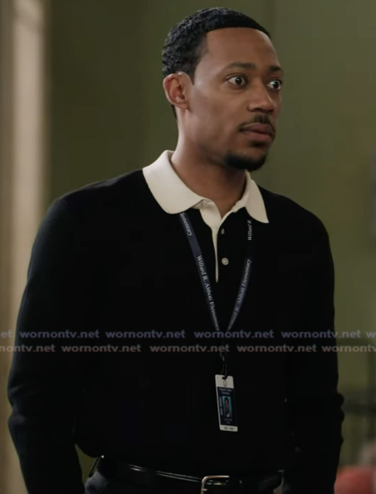 Gregory’s black contrast collar sweater on Abbott Elementary