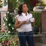 Tina’s grey layered sweater vest on The Neighborhood