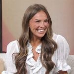 Hanna Brown’s white embroidered ruffle top on Access Hollywood