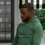 Andre’s green hoodie on Beyond the Gates