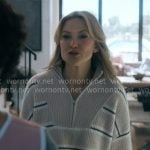 Isla’s beige striped quarter zip sweater on Running Point