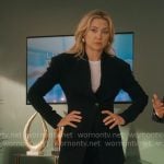 Isla’s black capri suit on Running Point
