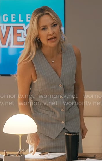 Isla’s grey pinstripe vest and skirt set on Running Point
